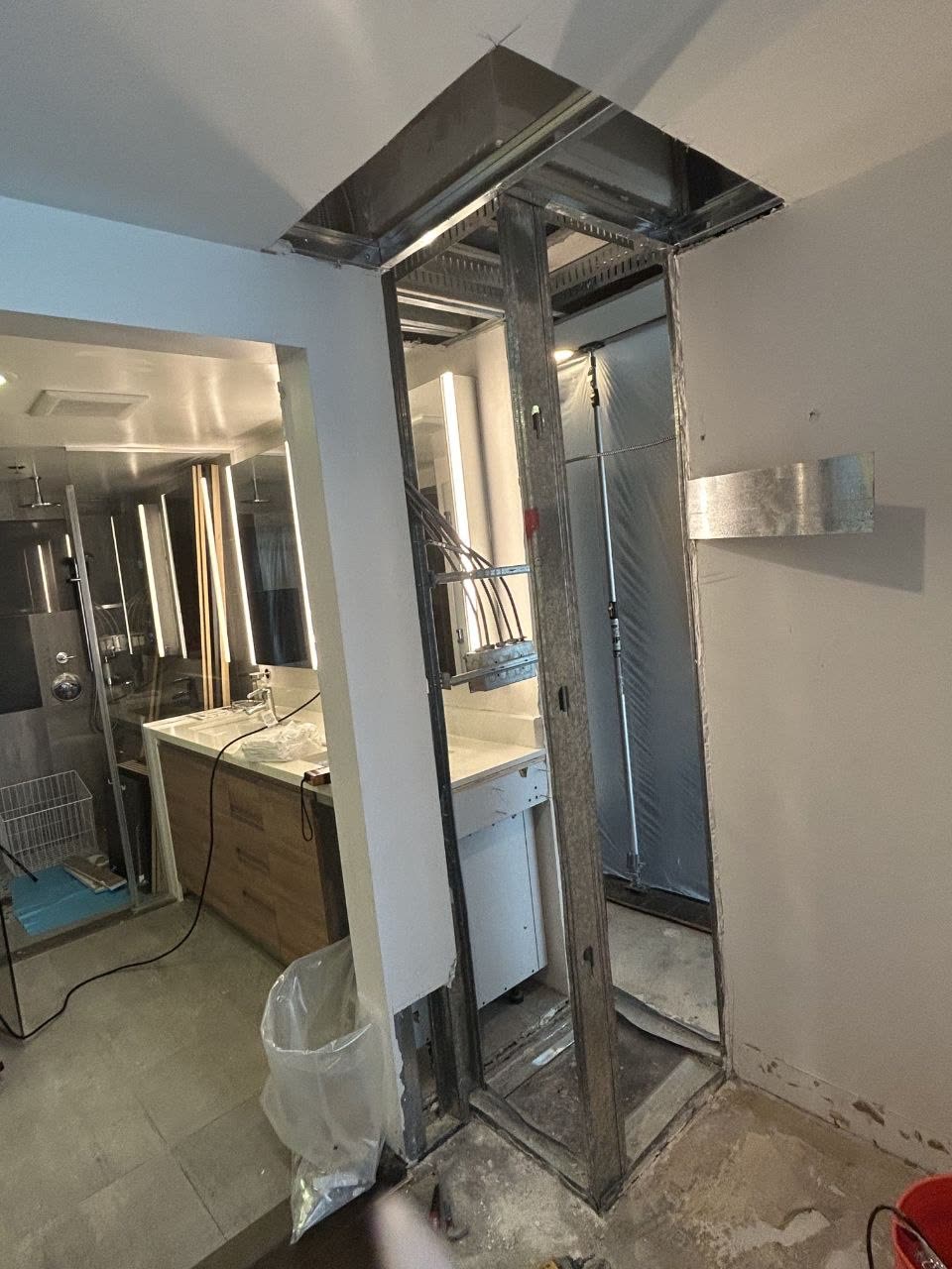 Interior opening and wall damage at a client property